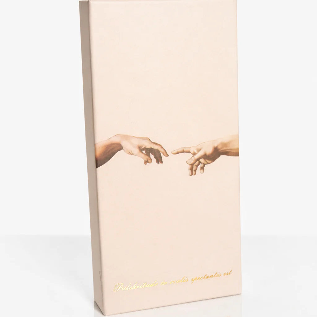 Rectangular box with artistic depiction of hands on a white background
